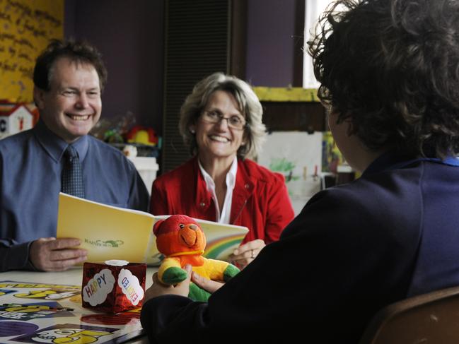 Paul Worsnop (left) volunteering at Parkdale Church of Christ in 2011. Picture: Chris Eastman