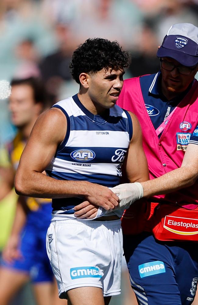 Stengle was in pain immediately after injuring his arm. Picture: Dylan Burns/AFL Photos via Getty Images