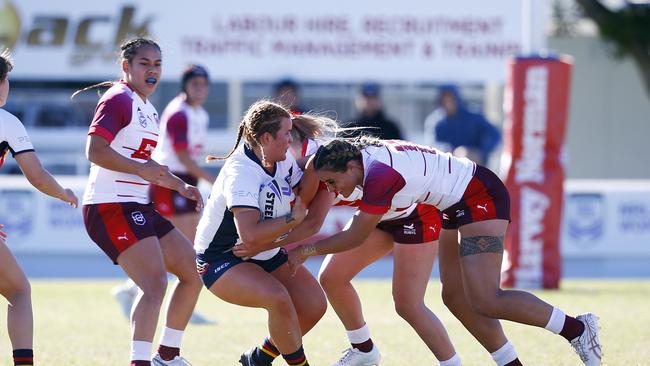 Action from the under-19s women's NRL championships game between Queensland Rubys and South Australia in Miami last season. Picture: Tertius Pickard