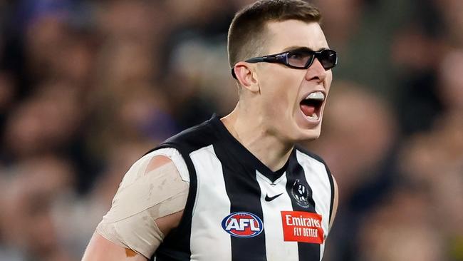 MELBOURNE, AUSTRALIA - SEPTEMBER 22: Mason Cox of the Magpies celebrates a goal during the 2023 AFL First Preliminary Final match between the Collingwood Magpies and the GWS GIANTS at Melbourne Cricket Ground on September 22, 2023 in Melbourne, Australia. (Photo by Dylan Burns/AFL Photos via Getty Images)