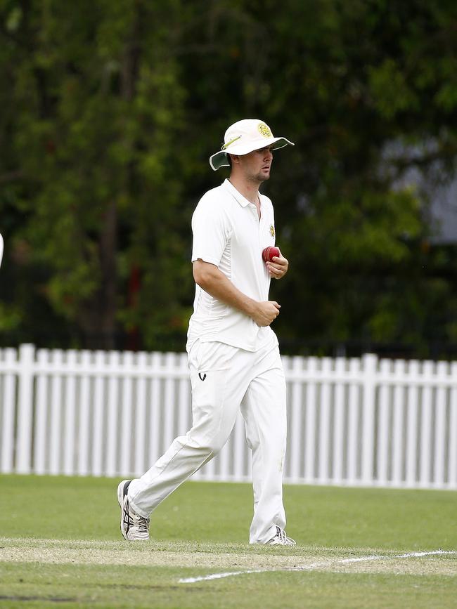 Action from the match between QLD University and Wynnum in St Lucia. Picture: Tertius Pickard