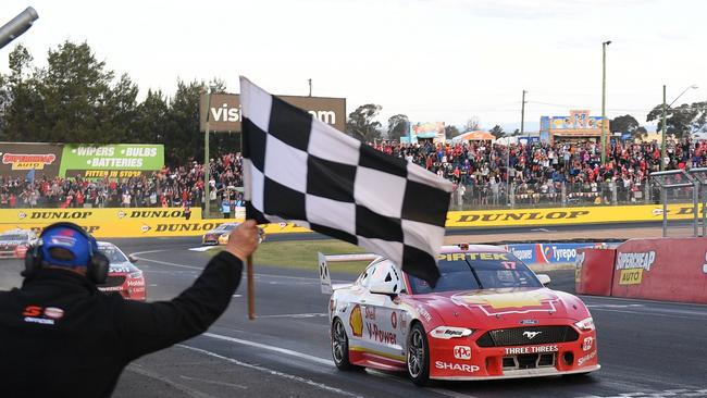 Scott McLaughlin takes the checkered flag in 2019.