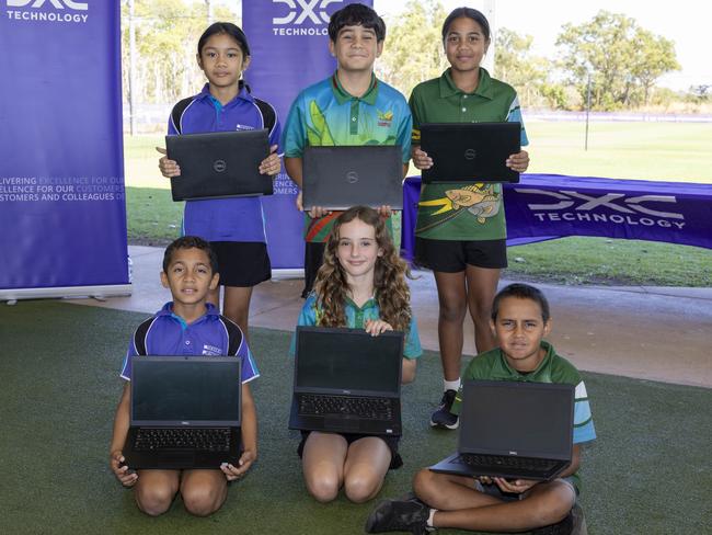 DXC Technology announced the donation of 90 laptops to three primary schools in Darwin - Ludmilla, Malak, and Millner - in partnership with NT Cricket and the Shell V-Power Racing Team. Picture: Mark Horsburgh
