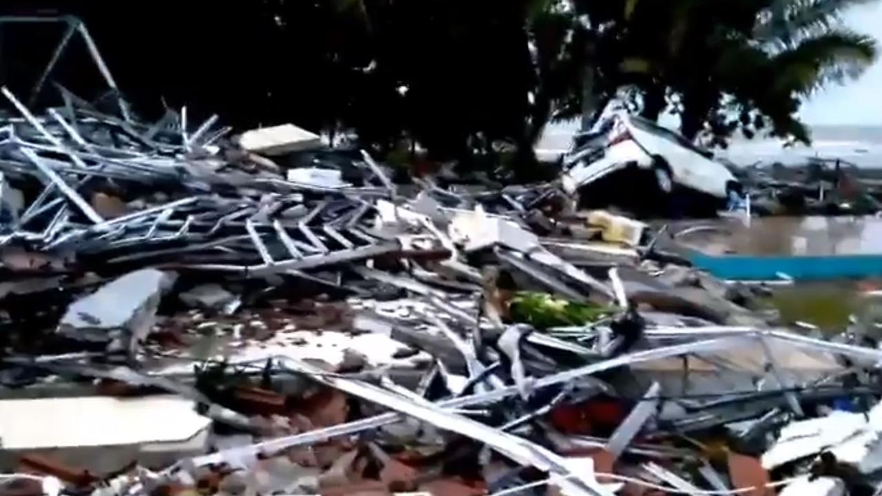 Daylight has revealed the extent of destruction caused by a tsunami in Indonesia.