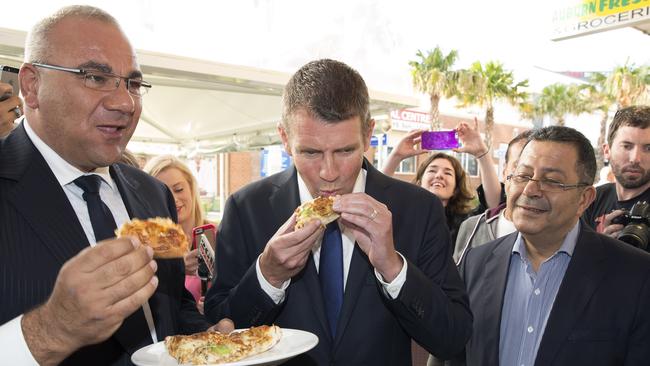 Ronney Oueik (left) with former NSW Premier Mike Baird in Auburn during a state election campaign. Picture: Andrew Murray