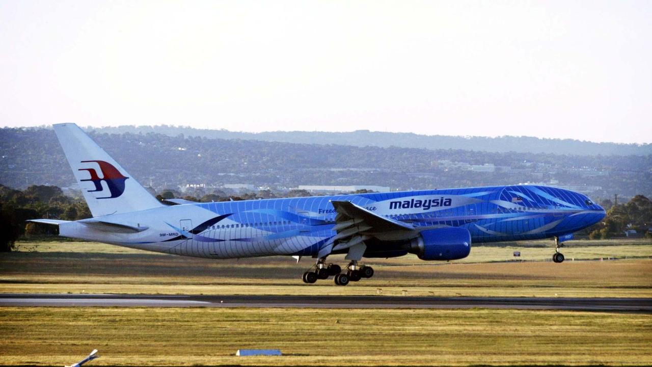Malaysia Airlines will resume flights to Adelaide in July. Pictured is the first international flight to arrive at Adelaide Airport&#039s new terminal in October, 2005, a Malaysia Airlines aircraft. Picture: Sam Wundke
