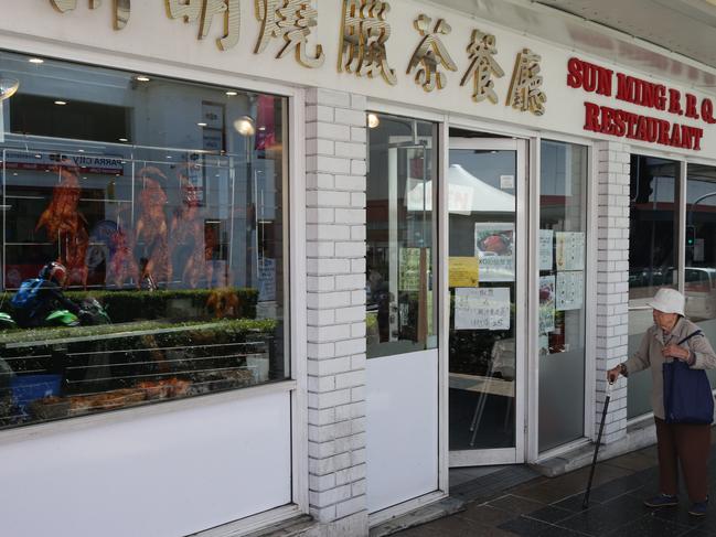 Sun Ming BBQ Restaurant located on Church Street at Parramatta. Shops displaying hand written signs in front of windows that could allegedly be job advertisements.