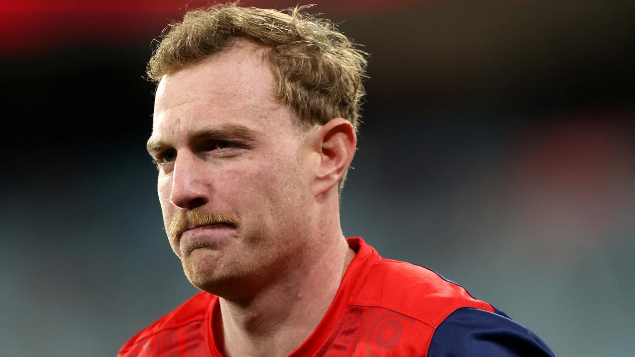 MELBOURNE, AUSTRALIA - JULY 13: Harrison Petty of the Demons warms up during the round 18 AFL match between Melbourne Demons and Essendon Bombers at Melbourne Cricket Ground, on July 13, 2024, in Melbourne, Australia. (Photo by Kelly Defina/Getty Images)