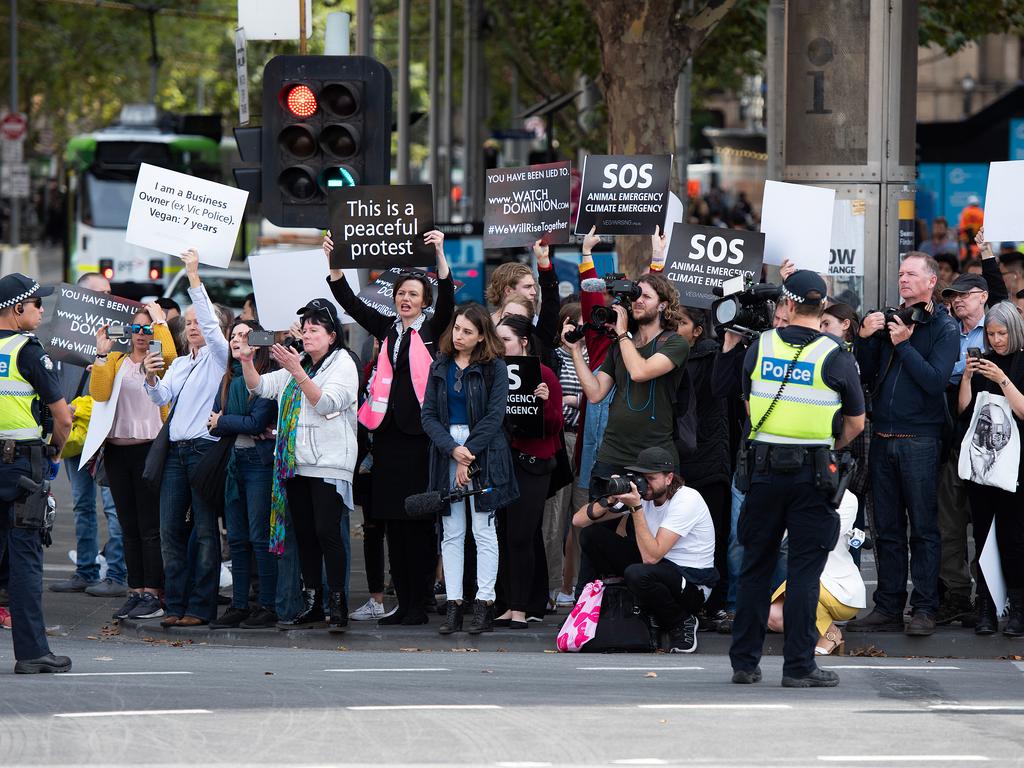 Animal rights protesters blocked one of Melbourne’s busiest intersections on Monday. Picture: Ellen Smith/AAP