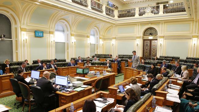 Question Time at the Queensland Parliament with members observing social distancing restrictions. (AAP Image/Josh Woning)