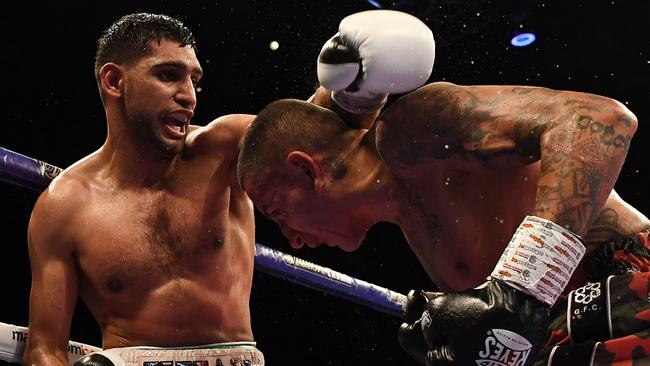 Khan was the unified light welterweight world champion from 2009 to 2012. (Photo by Paul ELLIS / AFP)