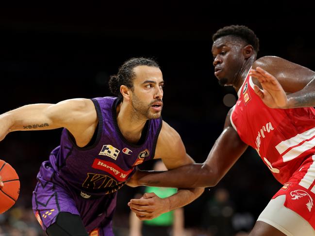 SYDNEY, AUSTRALIA - SEPTEMBER 29: Xavier Cooks of the Kings takes on Darius Days of the Hawks during the round two NBL match between Sydney Kings and Illawarra Hawks at Qudos Bank Arena, on September 29, 2024, in Sydney, Australia. (Photo by Mark Metcalfe/Getty Images)