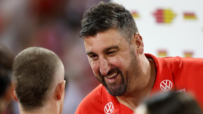 Coach Dean Cox has a laugh with Sydney's Chad Warner at quarter time during the AFL Opening Round match between the Sydney Swans and Hawthorn Hawks at the SCG on March 7, 2025. Photo by Phil Hillyard (Image Supplied for Editorial Use only - **NO ON SALES** - Â©Phil Hillyard )