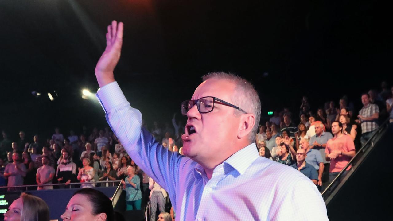 Prime Minister Scott Morrison with his wife Jenny on Easter Sunday at the Horizon Church in Sutherland. Picture: Gary Ramage