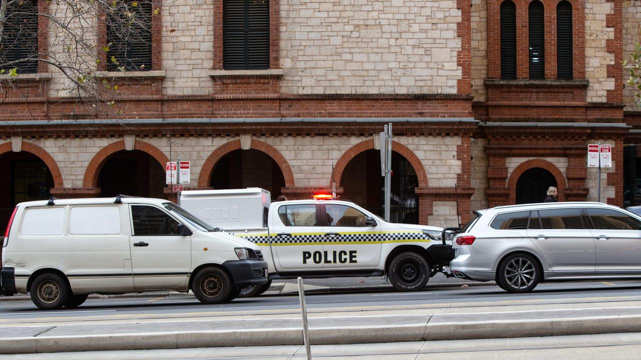 Police outside Parliament House. Picture: Brett Hartwig