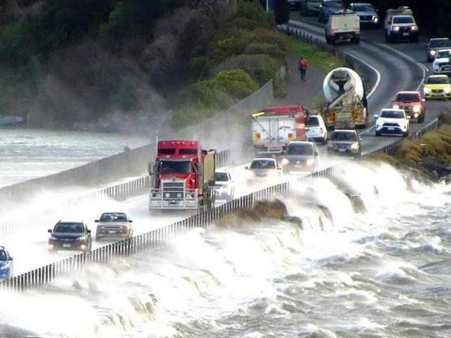 Wild weather hits Tasmania with morning drivers battling harsh conditions at the causeway at Midway Point. Picture: Facebook