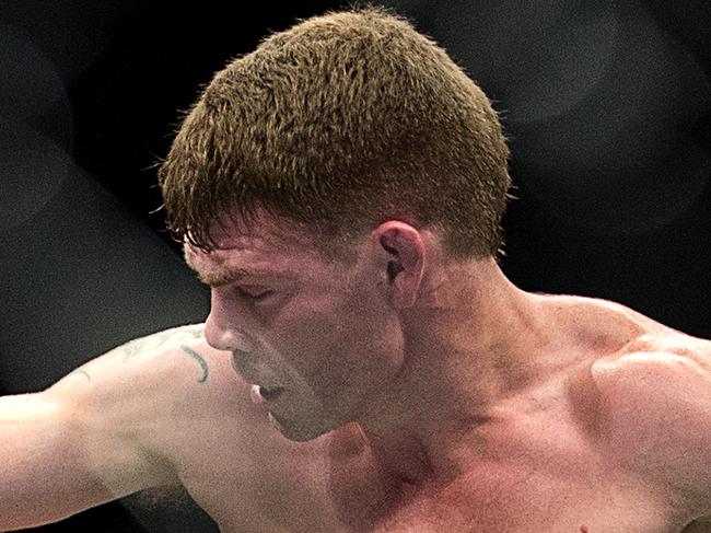 Jason Saggo, left, from Charlottetown, Prince Edward Island battles Paul Felder from Philadelphia in their lightweightweight bout at UFC Fight Night 54 in Halifax Saturday, October 4, 2014. Felder won a split decision. (AP Photo/The Canadian Press, Andrew Vaughan)