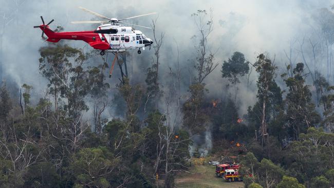 Fire crews tackle the blaze in Melbourne’s outer east. Picture: Jason Edwards