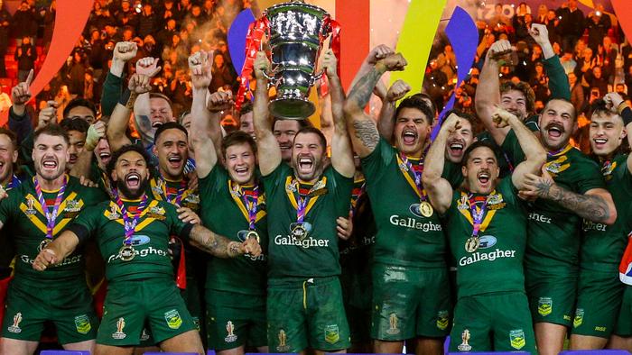MANCHESTER, ENGLAND - NOVEMBER 19: Australia lift the trophy during the Rugby League World Cup Final match between Australia and Samoa at Old Trafford on November 19, 2022 in Manchester, England. (Photo by Alex Dodd - CameraSport via Getty Images)