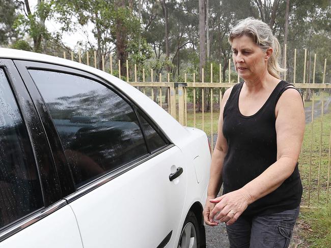 Julene Thorburn leaves her property, where she returned after being released on bail. Picture: Tara Croser.