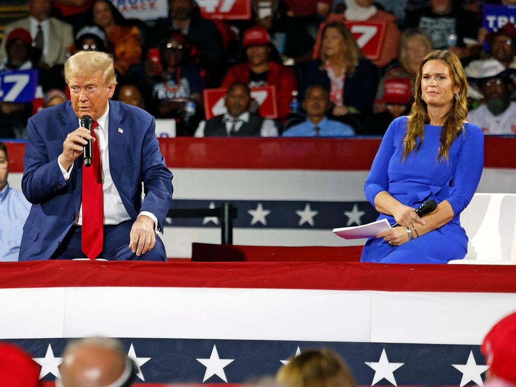 Former US President and Republican presidential candidate Donald Trump attends a town hall meeting moderated by Arkansas Governor Sarah Huckabee Sanders at the Dort Financial Center in Flint, Michigan. Picture: AFP