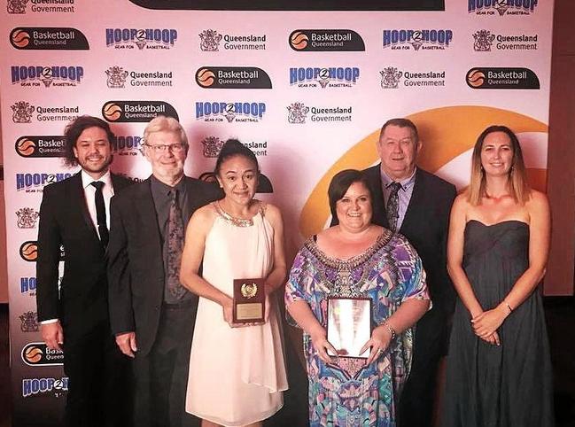 TOP AWARD: Ipswich Basketball Association representatives (from left) Sean Fernance (operations manager), Jon Simpson (president), Tiresa Afamasaga (competitions officer), Brooke Norgrove (treasurer), Terry Lindeberg (volunteer) and Megan Brockhurst (board member) collect the state award.