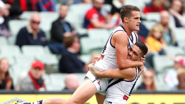 Harley Balic celebrating his first AFL goal with Michael Walters. Photo by Adam Trafford/AFL Media/Getty Images