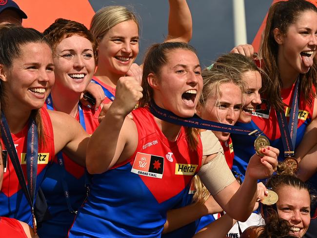 BRISBANE, AUSTRALIA - NOVEMBER 27: Melbourne Demons celebrate during the AFLW Grand Final match between the Brisbane Lions and the Melbourne Demons at Brighton Homes Arena on November 27, 2022 in Brisbane, Australia. (Photo by Albert Perez/AFL Photos/Getty Images)