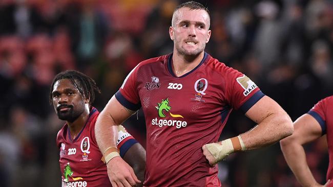 Izack Rodda of the Reds (right) reacts following the Round 15 Super Rugby match between the Queensland Reds and the Highlanders at Suncorp Stadium in Brisbane, Saturday, May 26, 2018. (AAP Image/Dave Hunt) NO ARCHIVING, EDITORIAL USE ONLY