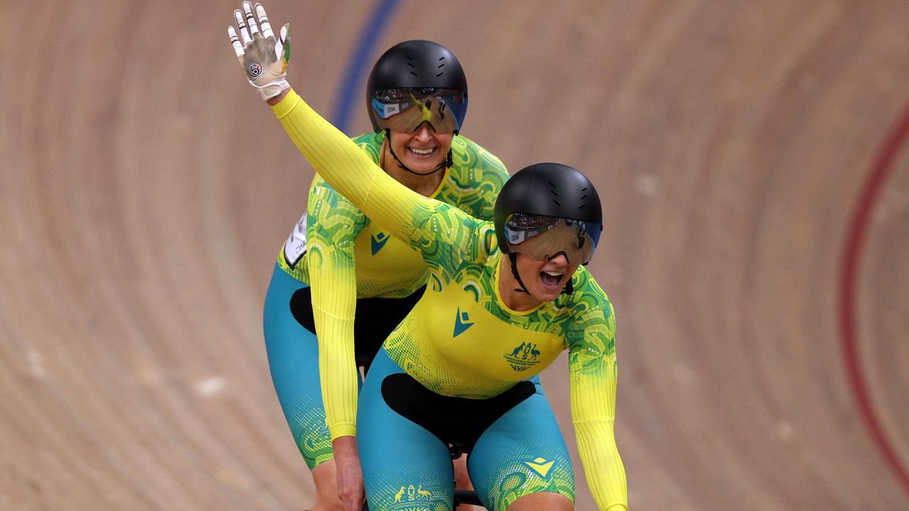 Australia's Jessica Gallagher (L) and pilot Caitlin Ward celebrate winning the women's para-sport sprint B tandem final in London. Picture: Adrian Dennis/AFP