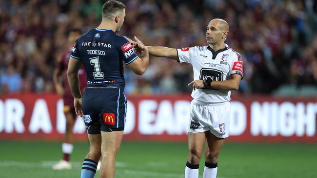 Referee Ashley Klein speaks to James Tedesco.