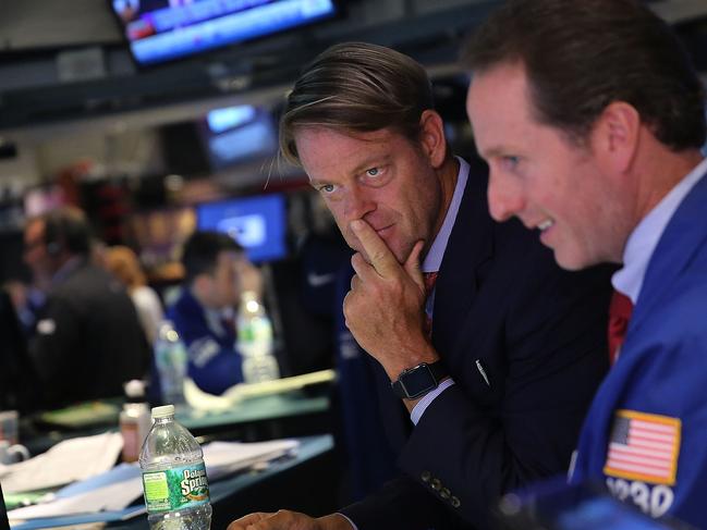 NEW YORK, NY - SEPTEMBER 18: Traders work on the floor of the New York Stock Exchange (NYSE) on September 18, 2015 in New York City. A day after the Federal Reserve decided not to raise interest rates, stocks fell on Friday with the Dow dropping over 290 points by the close. Spencer Platt/Getty Images/AFP == FOR NEWSPAPERS, INTERNET, TELCOS & TELEVISION USE ONLY ==