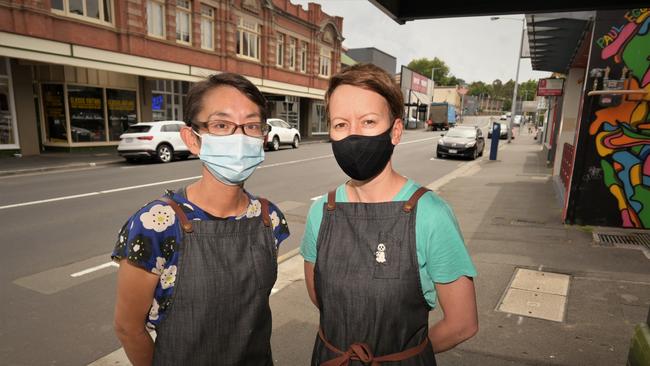 GHOST TOWN: Sachie Cafe owners Satoko Takano and Caroline Delandre say foot traffic has plummeted since the border reopening. Picture: Kenji Sato