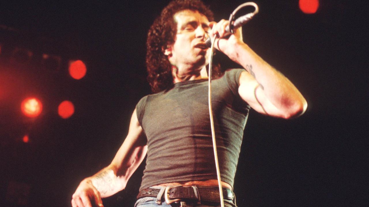 Bon Scott performs on stage with AC/DC in 1976. Picture: Getty