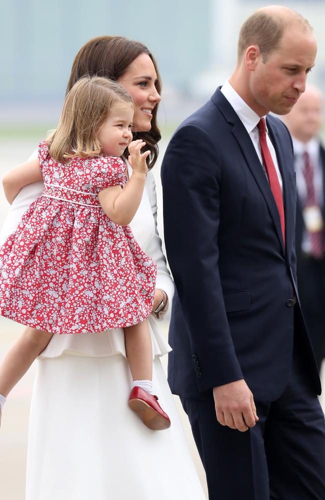 Even William’s tie was tied into the family’s outfit theme of red, white and navy. Picture: AFP