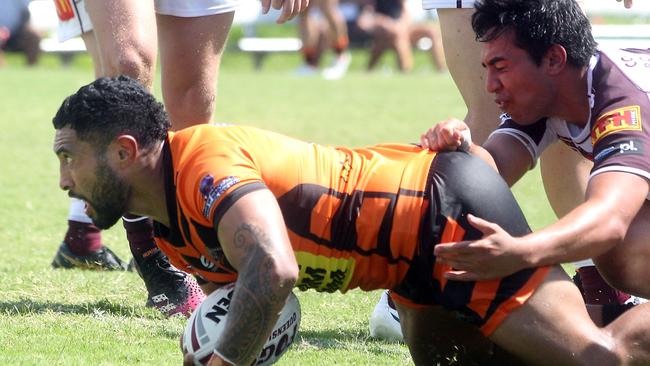 Sione Katoa scores for the Tigers in Round 1 against Burleigh. Picture by Richard Gosling