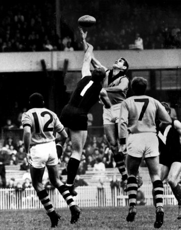 <p>13: JOHN NICHOLLS. Nicholls and Graham "Polly" Farmer contest the ball in the air. Nicholls is famous as a ruckman, and as the captain who led Carlton to its notorious grand final victory over Collingwood in 1970.</p>