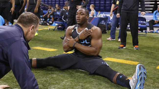 Chris Smith has measurements taken during the 2014 NFL Combine. Photo by Joe Robbins/Getty Images