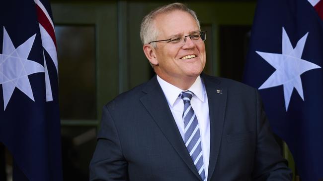 Prime Minister Scott Morrison is working with NSW to accelerate the resumption of international travel. Picture: Rohan Thomson/Getty Images