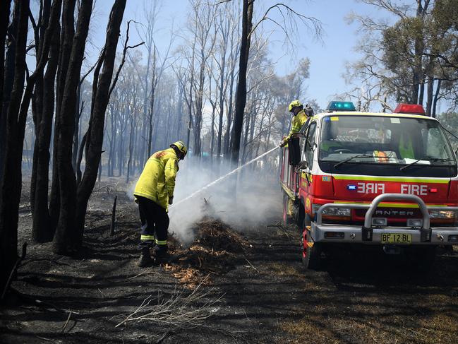 More than a dozen firefighters battled to get the blaze under control. Picture: Dan Himbrechts