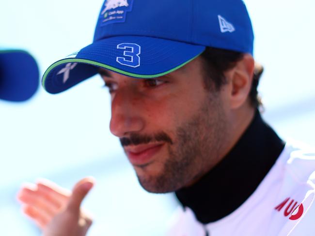 MELBOURNE, AUSTRALIA - MARCH 24: Daniel Ricciardo of Australia and Visa Cash App RB looks on from the drivers parade prior to the F1 Grand Prix of Australia at Albert Park Circuit on March 24, 2024 in Melbourne, Australia. (Photo by Mark Thompson/Getty Images)