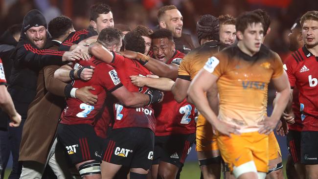 Crusaders players celebrate victory at full time. Picture: Getty Images