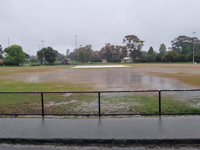 The flooded south oval at Kew Cricket Club on Saturday morning.