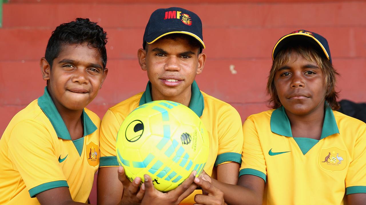 Young Australian Indigenous footballers from the John Moriarty Football team from Borroloola in the Northern Territory attend an Australian Socceroos training session