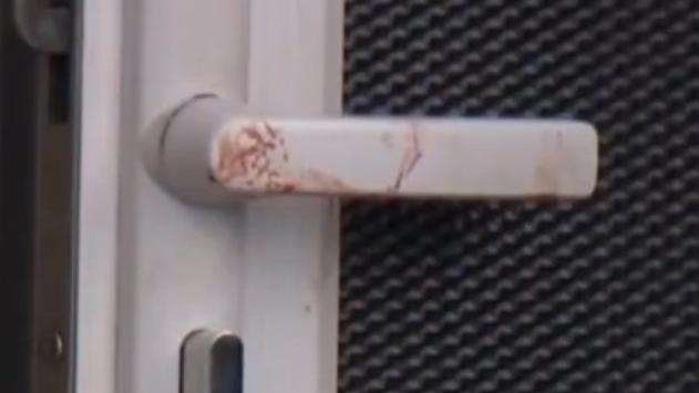 Blood found on a screen door handle.