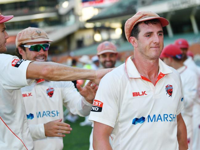 Daniel Worrall of the Redbacks walks from the field with team mates after day 4 of the Marsh Sheffield Shield match between the South Australia Redbacks and Western Australia Warriors at Adelaide Oval in Adelaide, Monday, February 17, 2020. (AAP Image/David Mariuz) NO ARCHIVING, EDITORIAL USE ONLY, IMAGES TO BE USED FOR NEWS REPORTING PURPOSES ONLY, NO COMMERCIAL USE WHATSOEVER, NO USE IN BOOKS WITHOUT PRIOR WRITTEN CONSENT FROM AAP