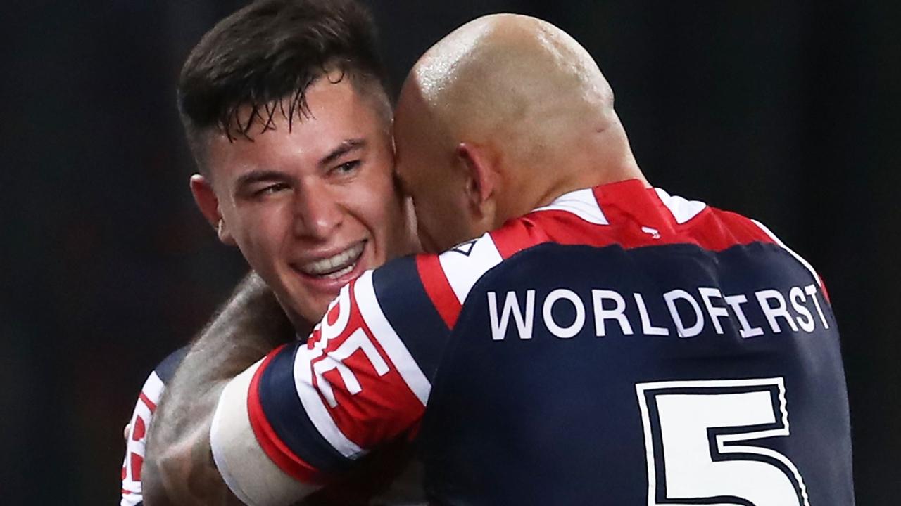 Joseph Manu of the Roosters celebrates scoring a grand final try with Blake Ferguson.