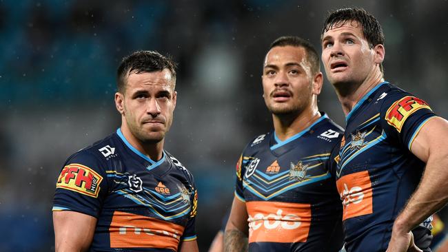 Titans players Corey Thompson, Phillip Sami and Anthony Don after the loss.