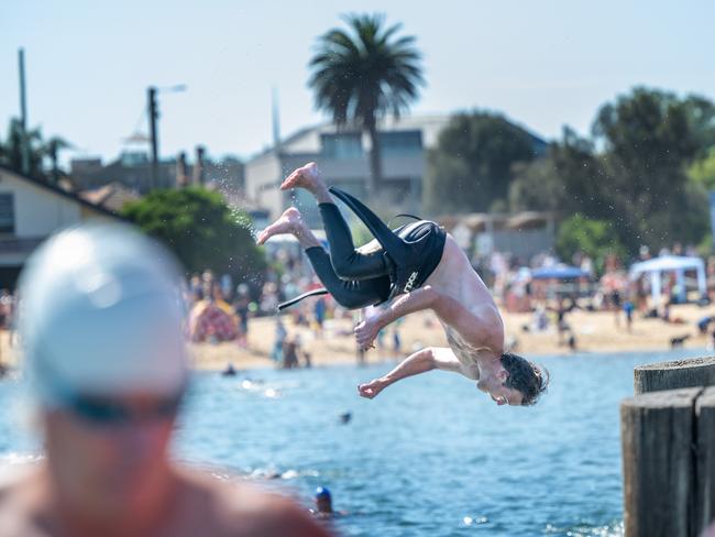 Beachgoers at Brighton Beach on Australia Day. Picture: Tony Gough