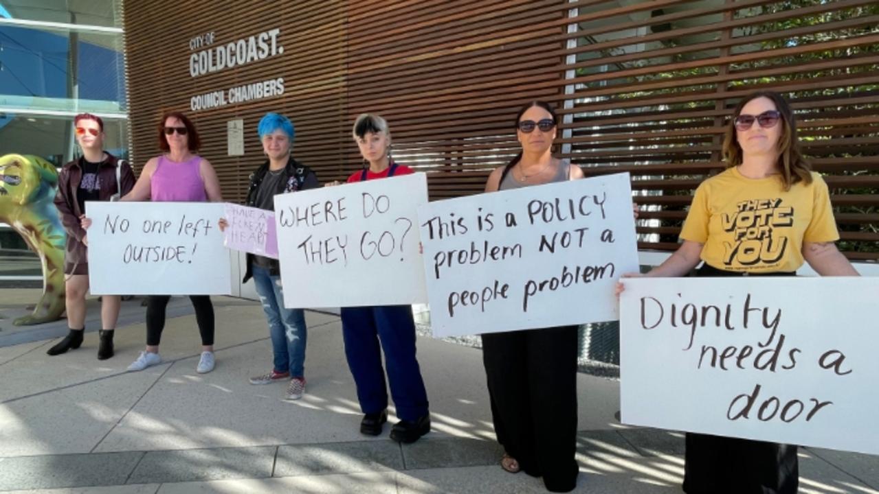 Supporters of the homeless in Carey Park stage a protest outside the Gold Coast City Council chambers on council's tough compliance policy.
